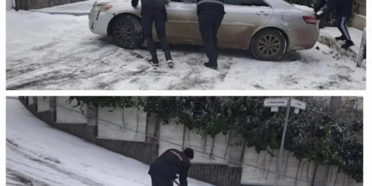 Carabinierii din Chișinău ajută un șofer aflat în dificultate pe strada Timiș, din cauza condițiilor meteo